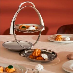 Anna Gong
FOLDING CAKE STAND
Alessi